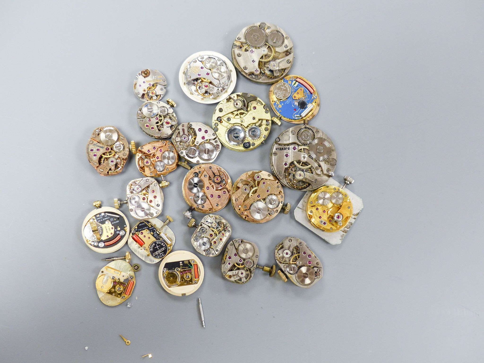 A small quantity of wrist watch movements including Baume & Mercier, Omega and Rotary.